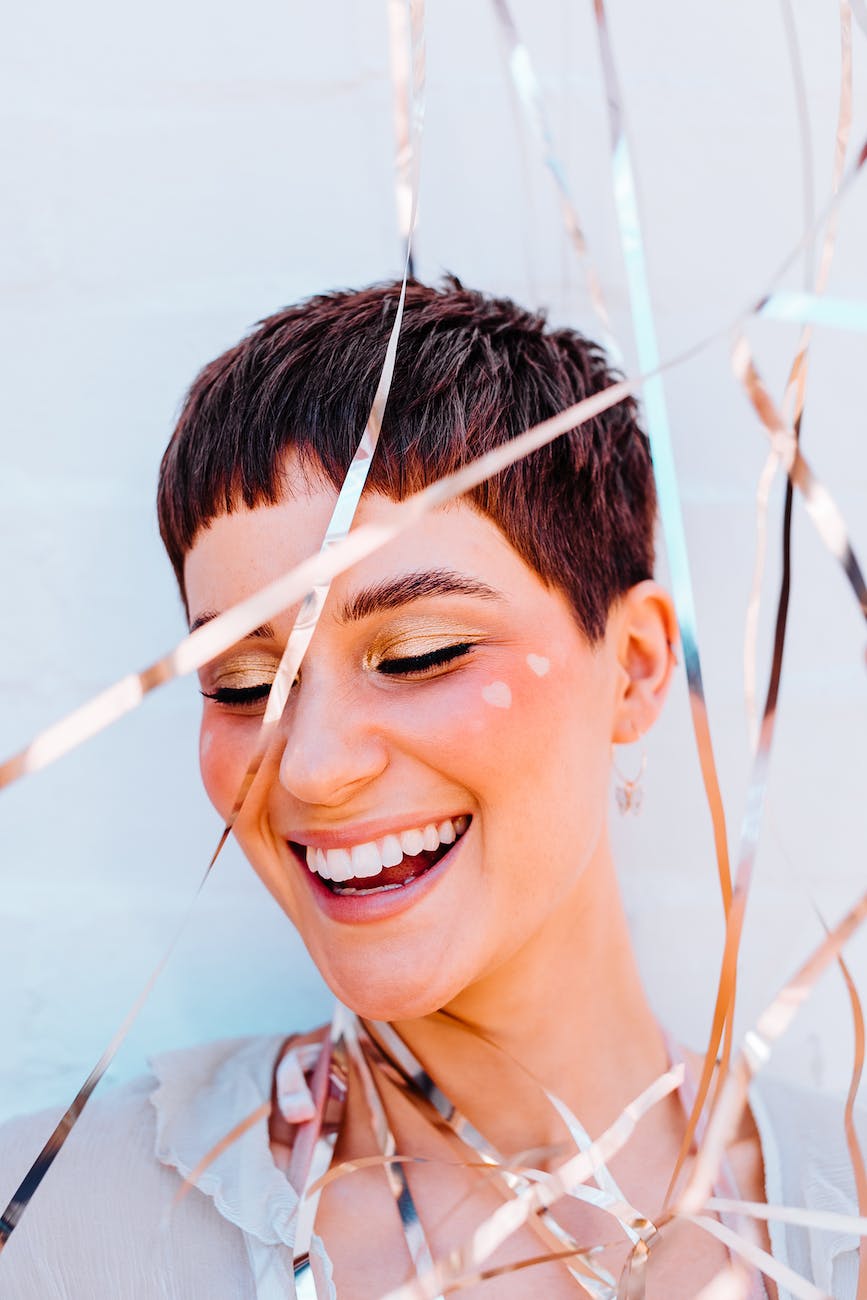 smiling woman in short hair with a beautiful smile